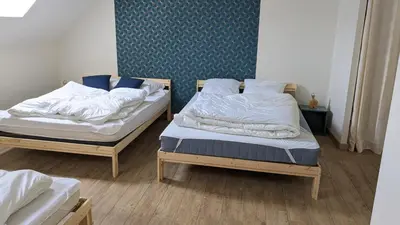 Un ou plusieurs lits dans un hébergement de l'établissement Le Puy de Côme