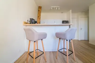 Cuisine ou kitchenette dans l'établissement Logis Cosy sur la Guierle - 1 Chambre