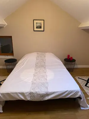 Un ou plusieurs lits dans un hébergement de l'établissement Maison à la campagne