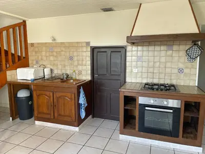 Cuisine ou kitchenette dans l'établissement Maison à la campagne