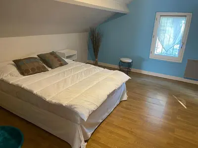 Un ou plusieurs lits dans un hébergement de l'établissement Maison à la campagne