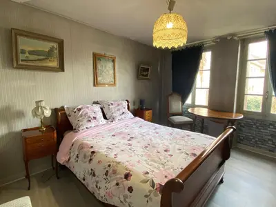 Un ou plusieurs lits dans un hébergement de l'établissement Appartement calme centre ville