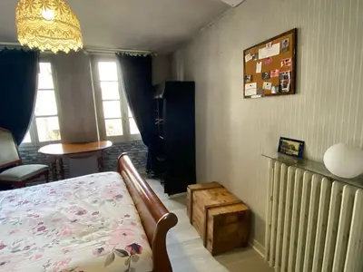 Un ou plusieurs lits dans un hébergement de l'établissement Appartement calme centre ville