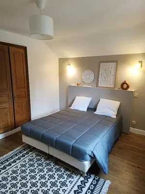 Un ou plusieurs lits dans un hébergement de l'établissement Maison de vacances à la campagne