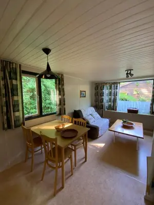 Coin salon dans l'établissement Cottage Rosa