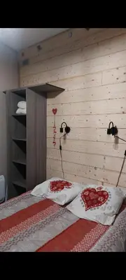 Un ou plusieurs lits dans un hébergement de l'établissement Villa de la dore