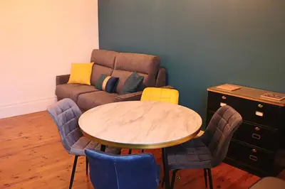 Coin salon dans l'établissement Appartement 2/4 pers Vacance-Cure cosy et ensoleillé