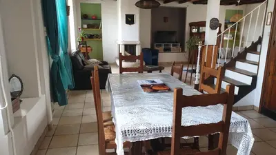 Coin salon dans l'établissement Maison de bourg