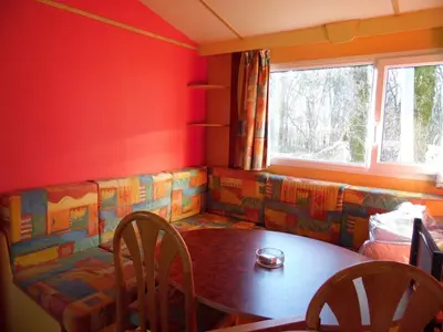 Coin salon dans l'établissement CAMPING LES PAILLOTES