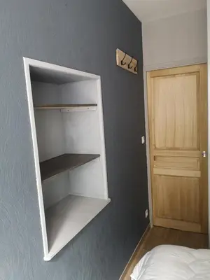 Un ou plusieurs lits dans un hébergement de l'établissement Appartement idéalement situé