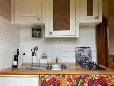 Cuisine ou kitchenette dans l'établissement Roulottes des terres de la chouette