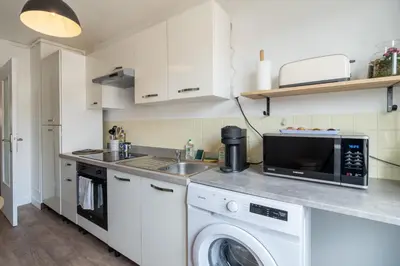 Cuisine ou kitchenette dans l'établissement Le Chaleureux, centre-ville l Parking privé dans une résidence & Netflix