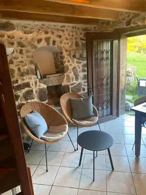 Coin salon dans l'établissement Maisonnette chaleureuse de 35m2