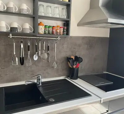Cuisine ou kitchenette dans l'établissement Le Lotois les Ondines