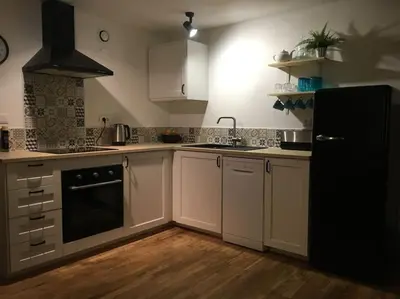 Cuisine ou kitchenette dans l'établissement Mirabel