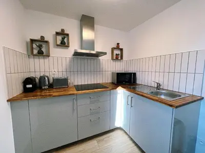 Cuisine ou kitchenette dans l'établissement Nid douillet T2 rénové climatisé centre