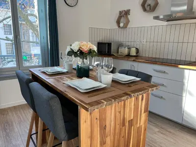 Cuisine ou kitchenette dans l'établissement Charmant appartement T2 cosy climatisé