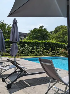 Piscine de l'établissement Château de Vassinhac chambres d'hôtes Collonges la rouge ou située à proximité