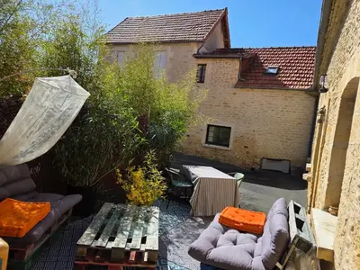 Coin salon dans l'établissement Gîte Talia