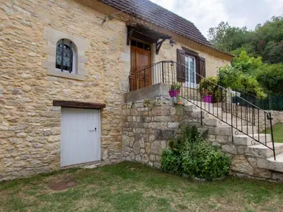 Jardin de l'établissement Charmante maison en pierre avec jardin clos, Tourtoirac - FR-1-616-280