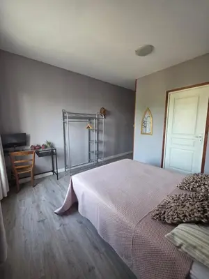 Un ou plusieurs lits dans un hébergement de l'établissement Chez Kahina ancien hôtel Robert