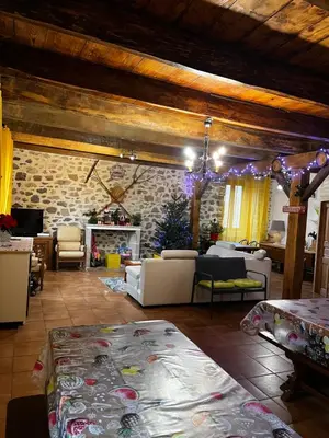 Un ou plusieurs lits dans un hébergement de l'établissement Gite à la ferme au coeur de l'Auvergne