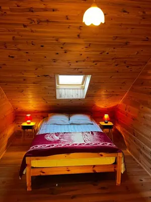 Un ou plusieurs lits dans un hébergement de l'établissement Gite à la ferme au coeur de l'Auvergne