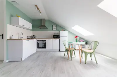 Cuisine ou kitchenette dans l'établissement @ LOFT COCOONING @ Proche gare & centre historique