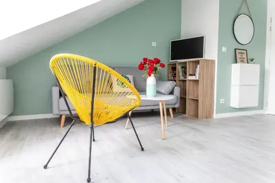 Télévision ou salle de divertissement dans l'établissement @ LOFT COCOONING @ Proche gare & centre historique