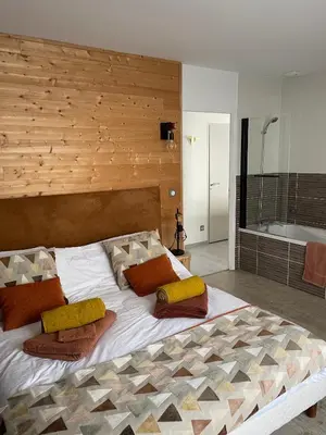 Un ou plusieurs lits dans un hébergement de l'établissement La Maison de l'Auzette