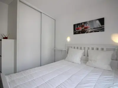 Un ou plusieurs lits dans un hébergement de l'établissement La Bourboule : Agréable T2 avec Terrasse, Balcon et Wifi - Proche Centre et Thermes - FR-1-608-245