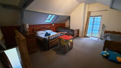 Un ou plusieurs lits dans un hébergement de l'établissement Le Hameau du Pagnon