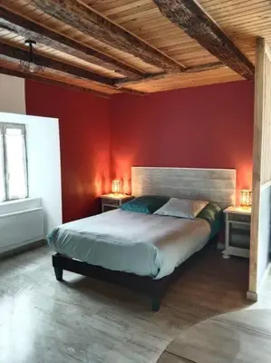 Un ou plusieurs lits dans un hébergement de l'établissement Le Cosy