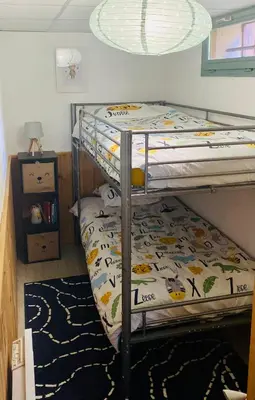 Un ou plusieurs lits dans un hébergement de l'établissement Appartement 4 personnes - CHALET COSY Mont Dore