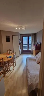 Un ou plusieurs lits dans un hébergement de l'établissement Appartement 4/6 le lioran