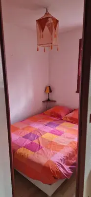 Un ou plusieurs lits dans un hébergement de l'établissement Appartement 4/6 le lioran