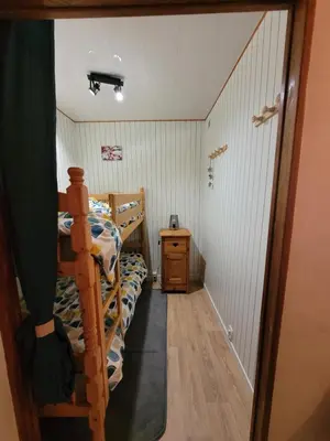 Un ou plusieurs lits dans un hébergement de l'établissement Studio cabine la Foret au plus près des pistes 36m2
